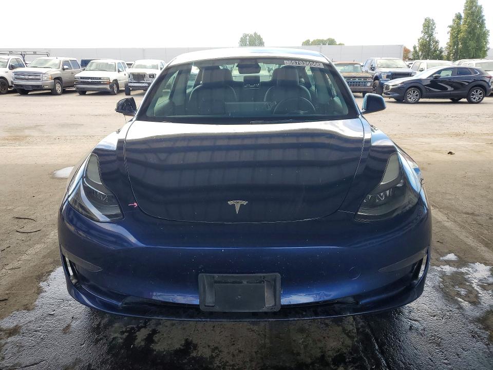 Photo 5 from auction – 2022 TESLA MODEL 3 with VIN 5YJ3E1EAXNF143469