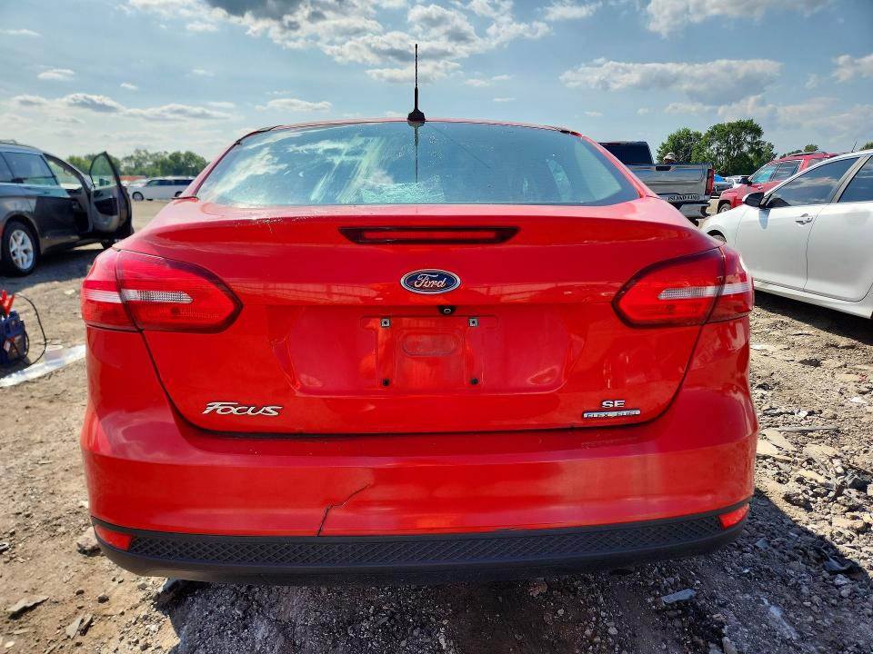 Photo 6 from auction – 2015 FORD FOCUS with VIN 1FADP3F24FL228913