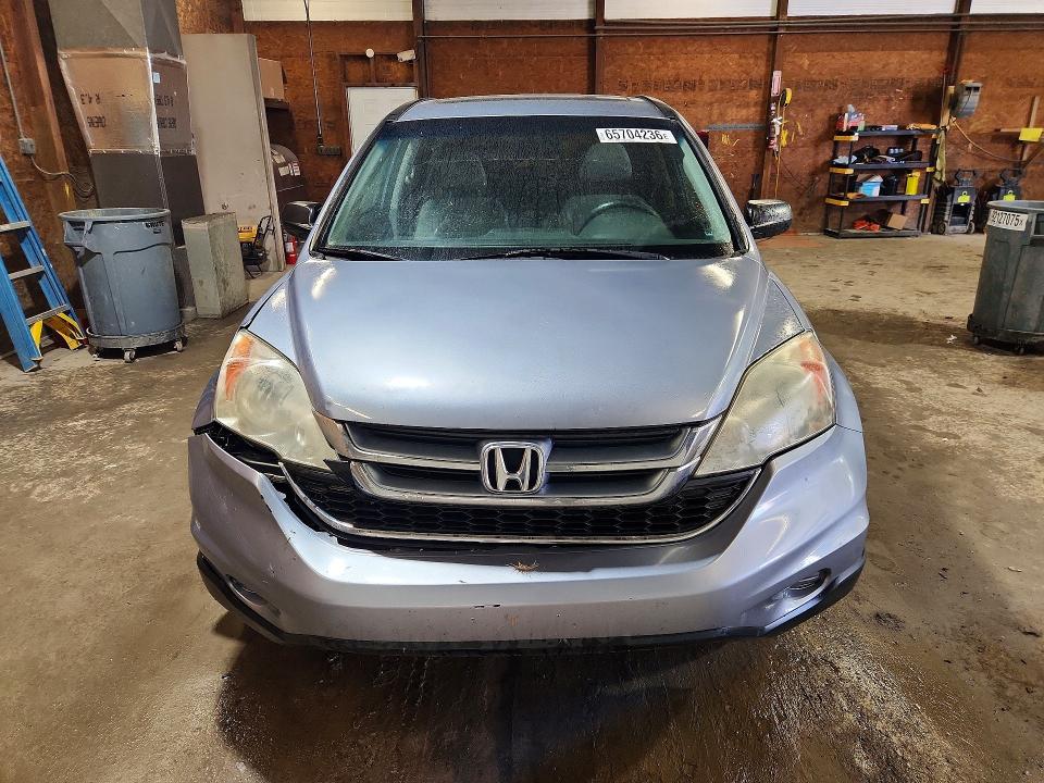 Photo 5 from auction – 2011 HONDA CR-V with VIN 5J6RE4H58BL030617