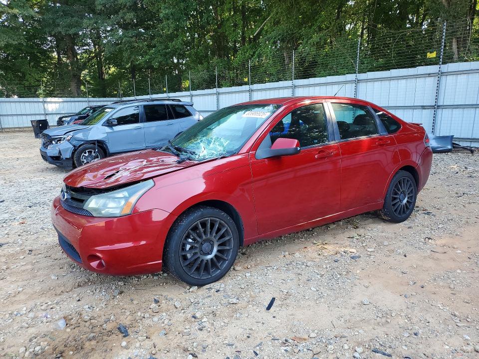FORD FOCUS 2010 with VIN 1FAHP3GNXAW233521 - Photo from auction