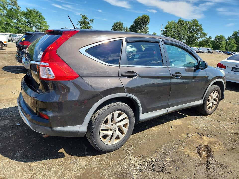 Photo 3 from auction – 2015 HONDA CR-V with VIN 2HKRM4H59FH678311