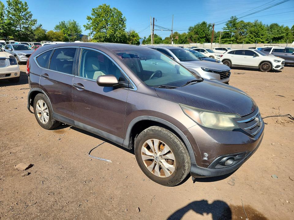 Photo 4 from auction – 2013 HONDA CR-V with VIN 5J6RM4H56DL040424
