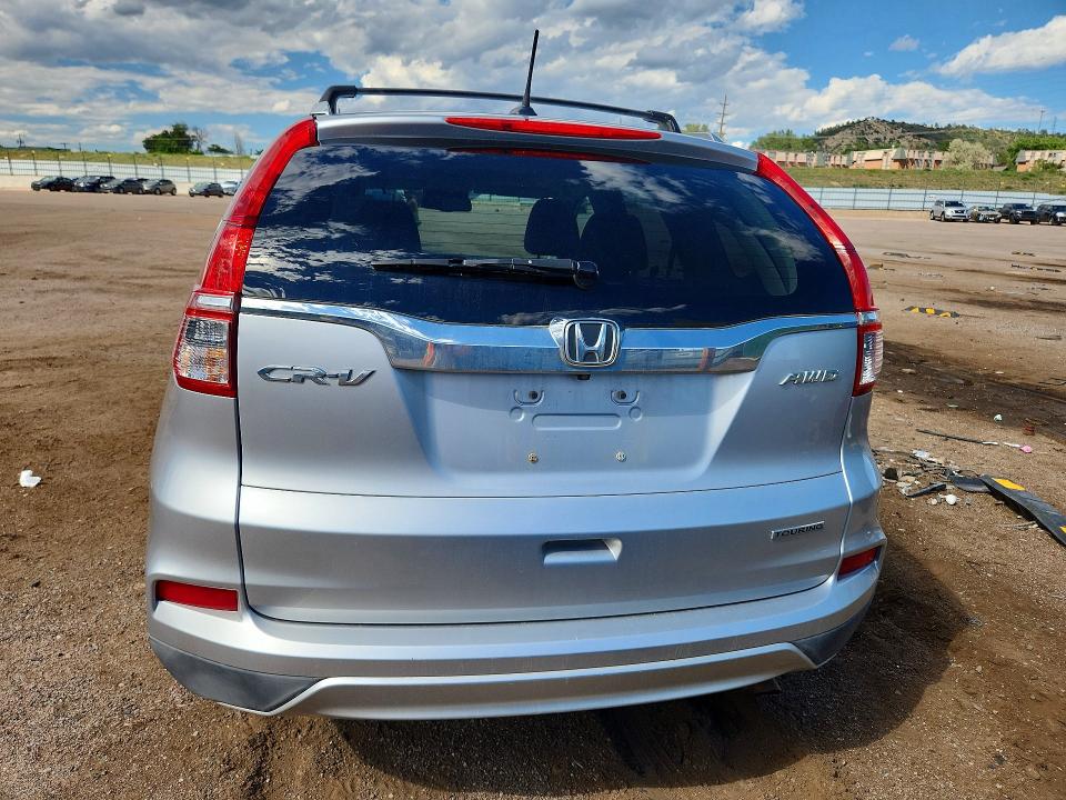 Photo 6 from auction – 2015 HONDA CR-V with VIN 5J6RM4H92FL107283
