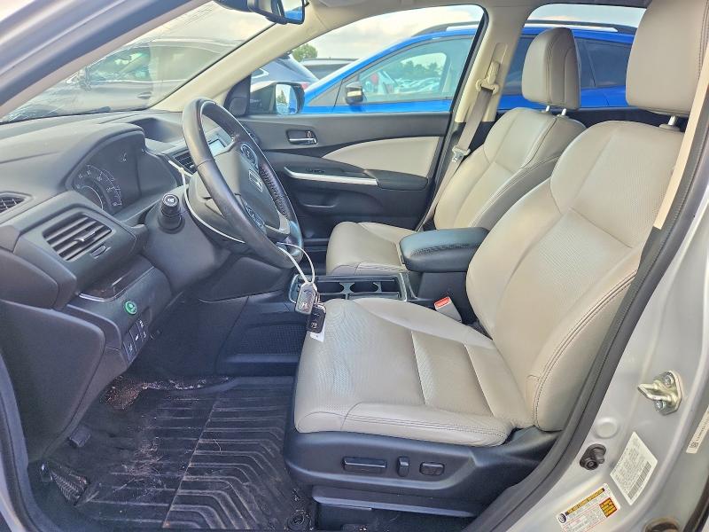 Photo 7 from auction – 2016 HONDA CR-V with VIN 5J6RM4H90GL101032