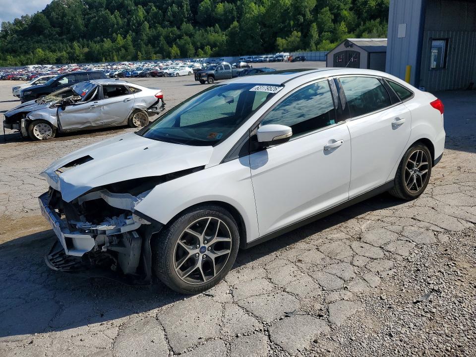 FORD FOCUS 2017 with VIN 1FADP3H28HL219051 - Photo from auction