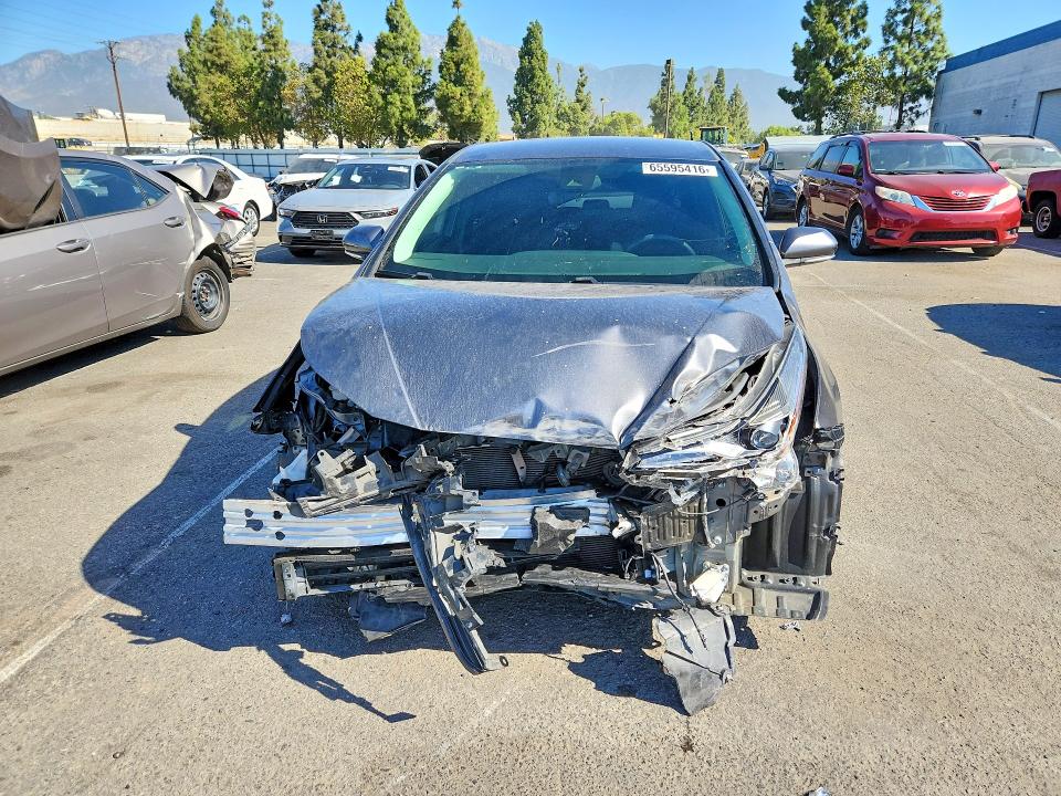 Photo 5 from auction – 2021 TOYOTA PRIUS with VIN JTDKAMFU4M3135817