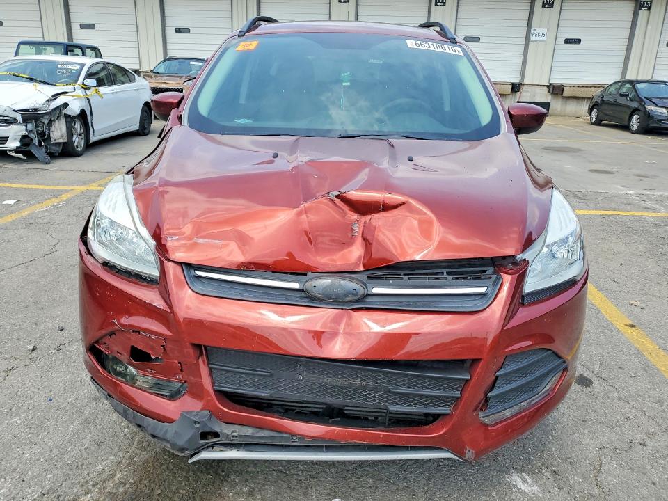 Photo 5 from auction – 2015 FORD ESCAPE with VIN 1FMCU9G92FUB91475
