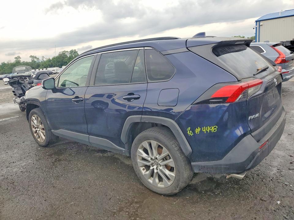 Photo 2 from auction – 2021 TOYOTA RAV4 with VIN JTMA1RFV1MD532137