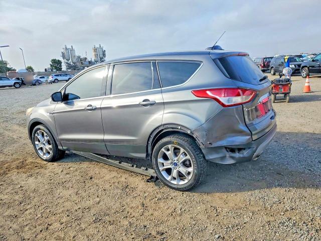 Photo 2 from auction – 2013 FORD ESCAPE with VIN 1FMCU9H97DUD55766