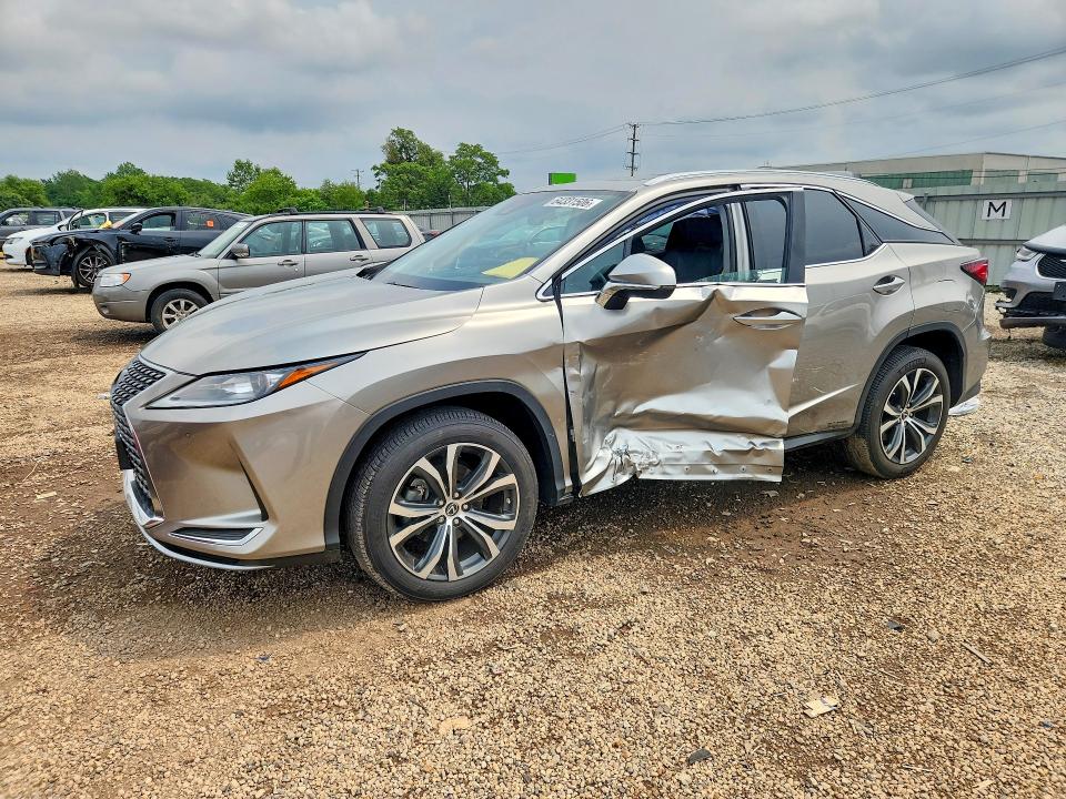 LEXUS RX 2021 with VIN 2T2HZMDA1MC299427 - Photo from auction