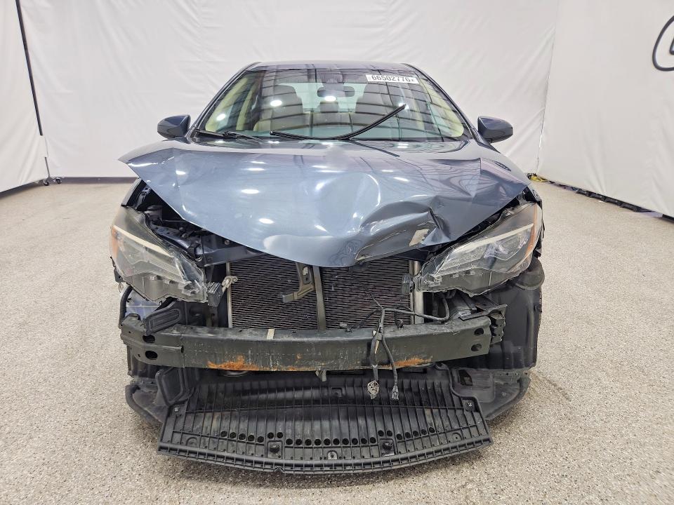 Photo 5 from auction – 2017 TOYOTA COROLLA with VIN 5YFBURHE2HP614177