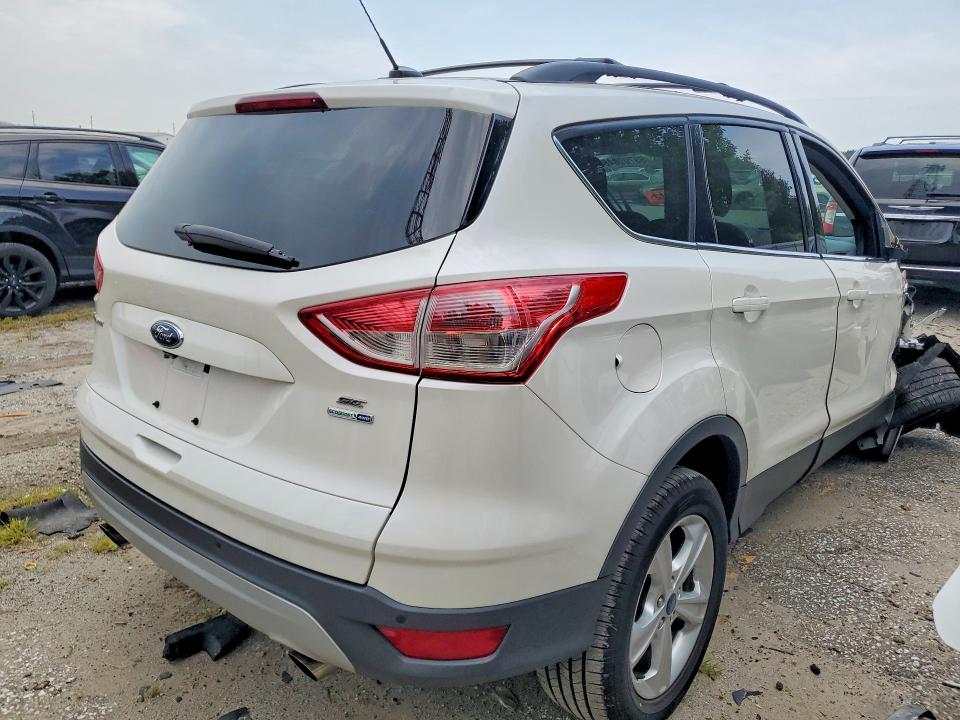 Photo 3 from auction – 2014 FORD ESCAPE with VIN 1FMCU9GX1EUE09564