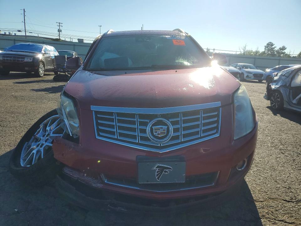 Foto 5 de la subasta – 2015 CADILLAC SRX con VIN 3GYFNCE33FS537781