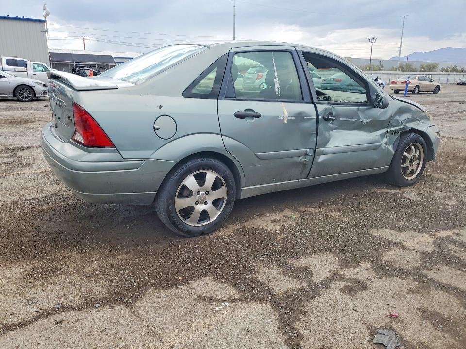Photo 3 from auction – 2003 FORD FOCUS with VIN 1FAFP38373W336337
