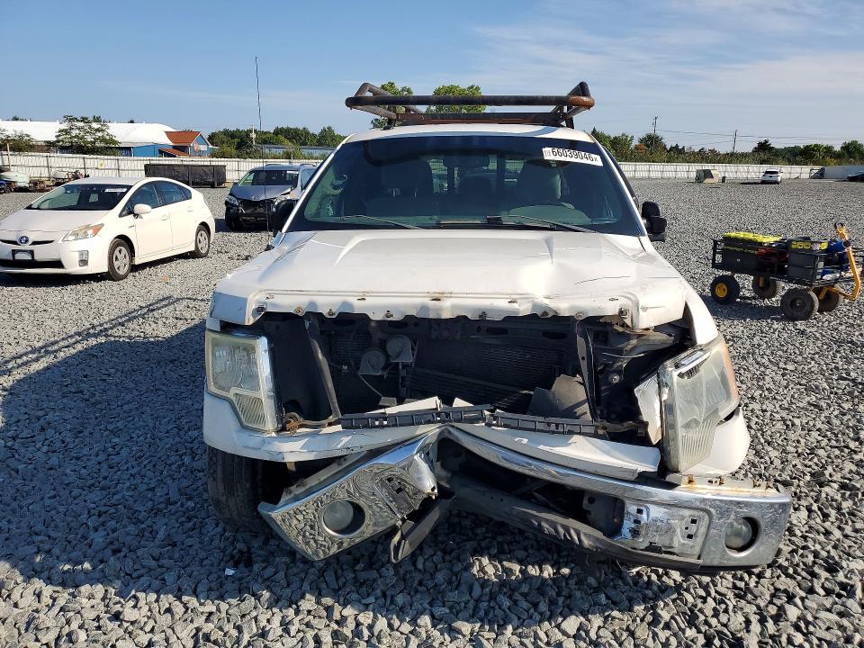 Photo 5 from auction – 2011 FORD F150 with VIN 1FTEX1CM9BFA74720