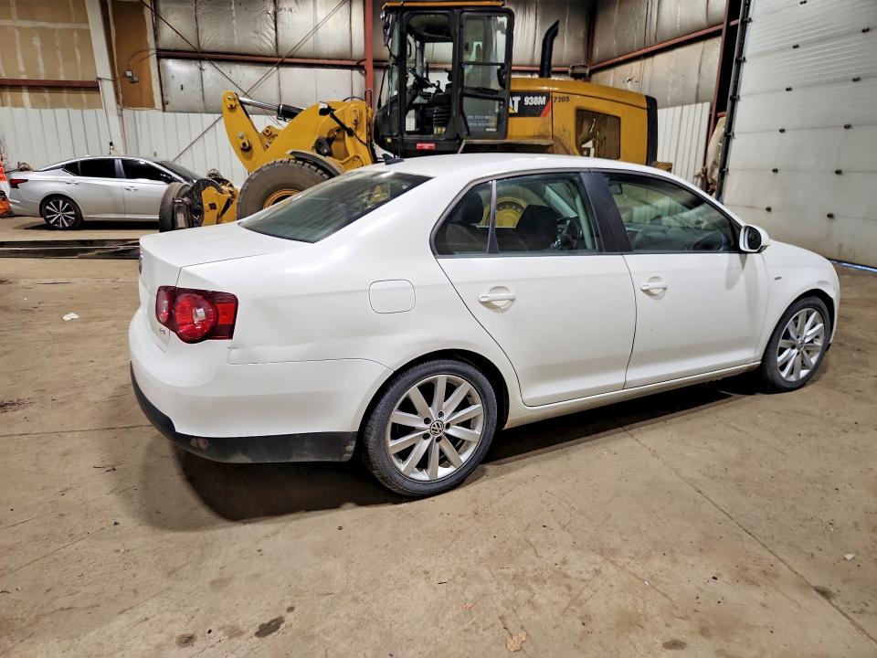 Photo 3 from auction – 2010 VOLKSWAGEN JETTA with VIN 3VWRA7AJ9AM036673