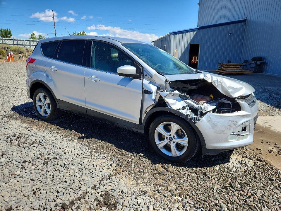 Photo 4 from auction – 2015 FORD ESCAPE with VIN 1FMCU9G95FUA09946