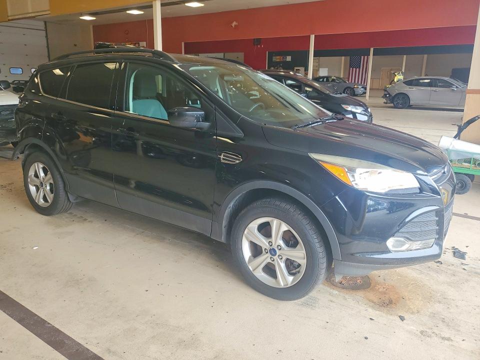 Photo 4 from auction – 2016 FORD ESCAPE with VIN 1FMCU9G93GUA16489