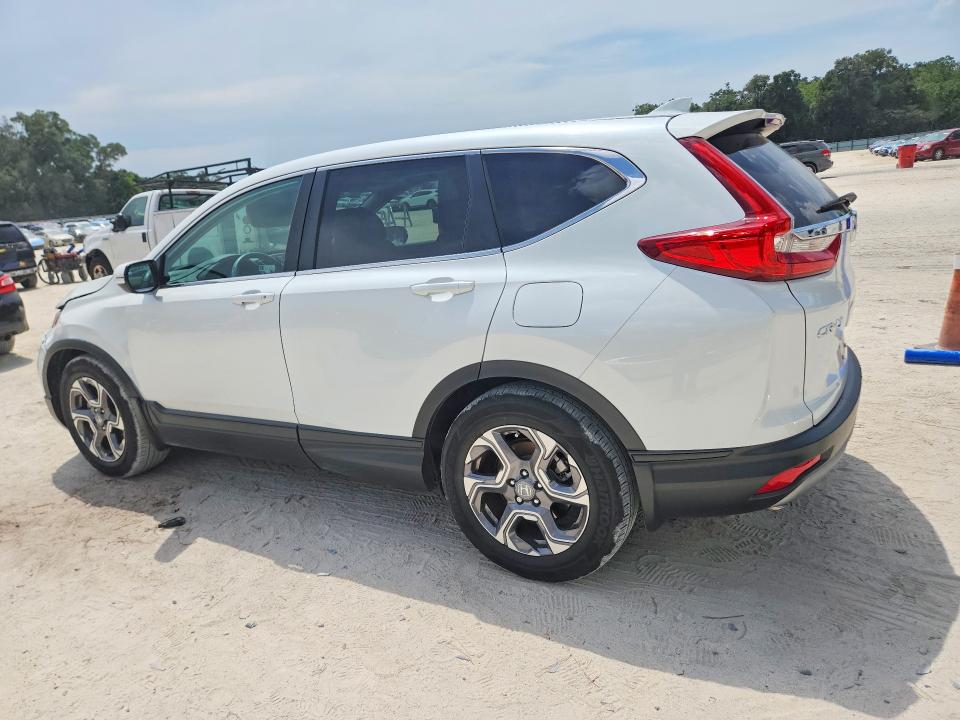 Photo 2 from auction – 2019 HONDA CR-V with VIN 7FARW1H84KE023277