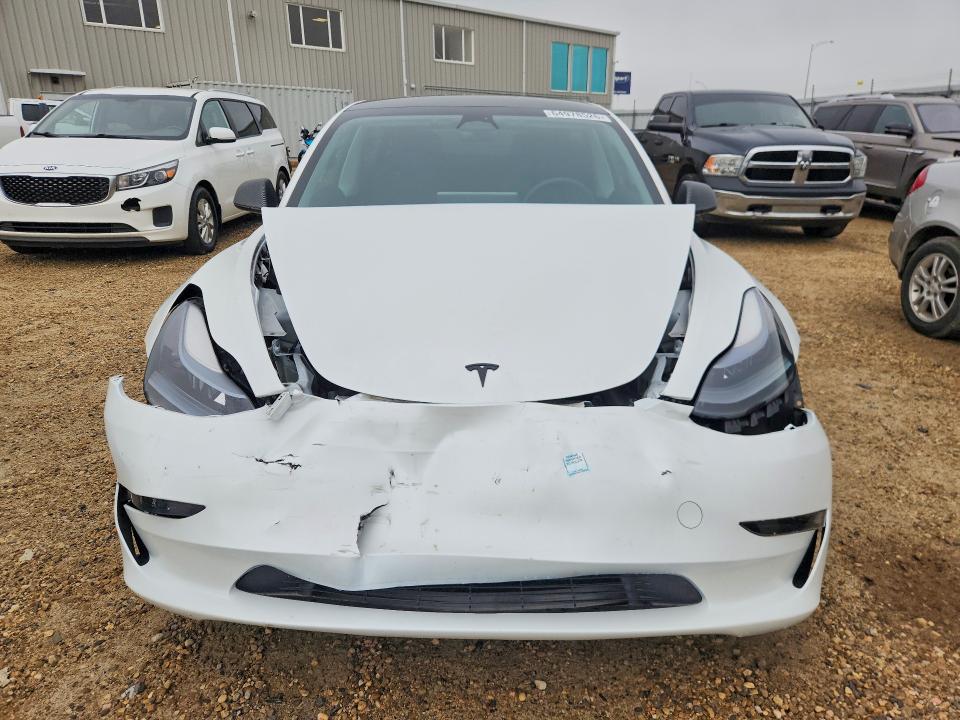 Photo 5 from auction – 2023 TESLA MODEL 3 with VIN LRW3E1FA0PC871958