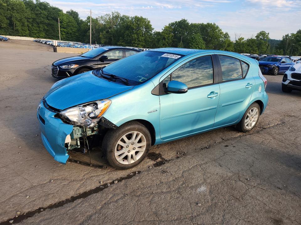 TOYOTA PRIUS C 2014 with VIN JTDKDTB33E1081504 - Photo from auction