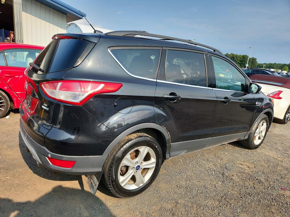 Photo 3 from auction – 2014 FORD ESCAPE with VIN 1FMCU9G98EUE04749