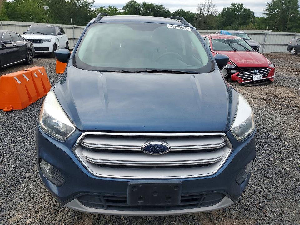 Photo 5 from auction – 2018 FORD ESCAPE with VIN 1FMCU9GD9JUB33232