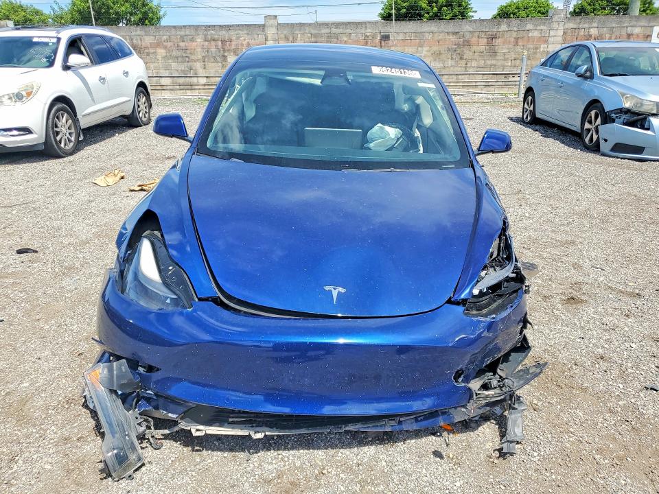 Photo 5 from auction – 2022 TESLA MODEL 3 with VIN 5YJ3E1EA2NF372292