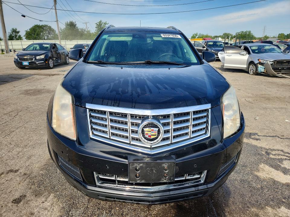 Photo 5 from auction – 2014 CADILLAC SRX with VIN 3GYFNBE3XES522073