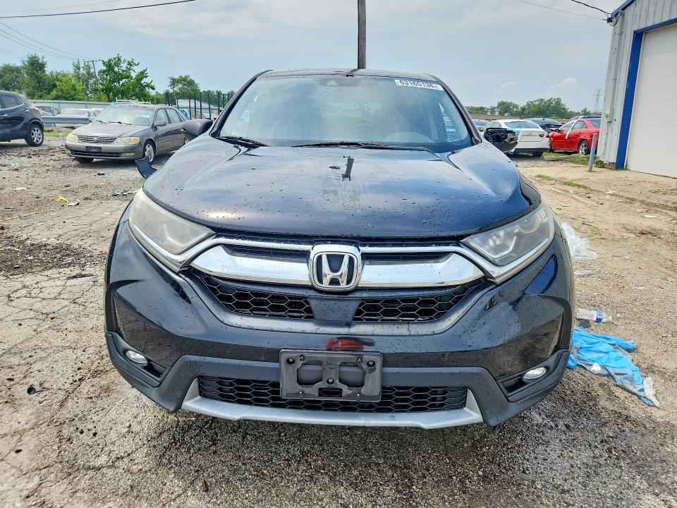 Photo 5 from auction – 2018 HONDA CR-V with VIN 7FARW2H87JE014058