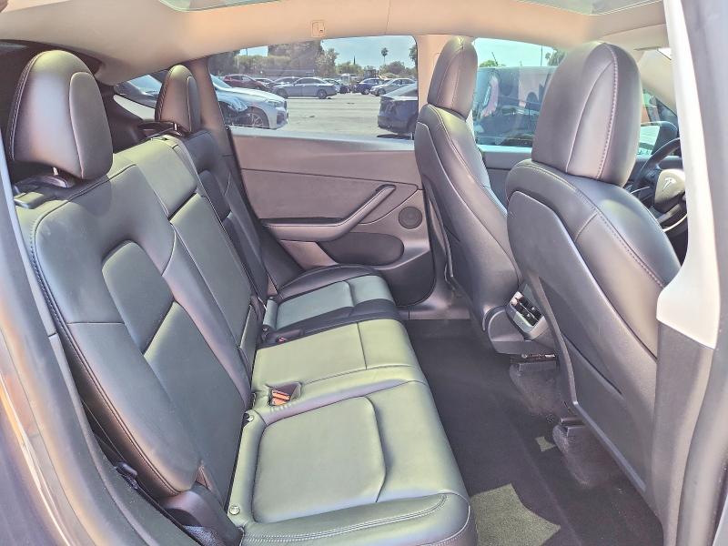 Photo 11 from auction – 2022 TESLA MODEL Y with VIN 7SAYGDEE1NF513828