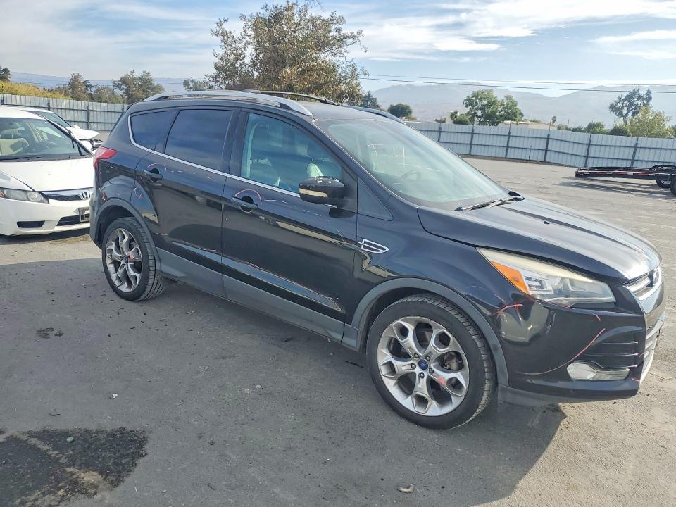 Photo 4 from auction – 2013 FORD ESCAPE with VIN 1FMCU9J90DUD39631