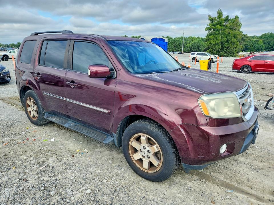 Photo 4 from auction – 2011 HONDA PILOT with VIN 5FNYF4H91BB095751