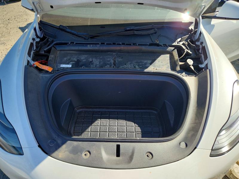 Photo 11 from auction – 2023 TESLA MODEL Y with VIN 7SAYGDEE3PF676547
