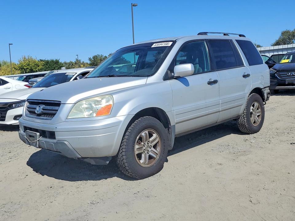 HONDA PILOT 2005 with VIN 2HKYF185X5H551618 - Photo from auction