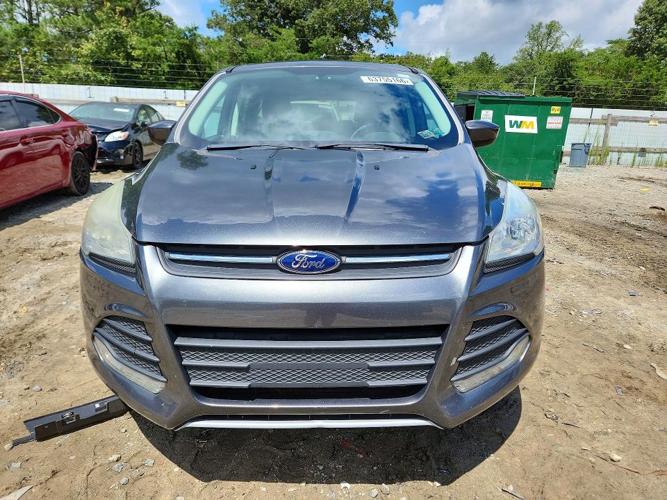 Photo 5 from auction – 2015 FORD ESCAPE with VIN 1FMCU9G90FUB55140