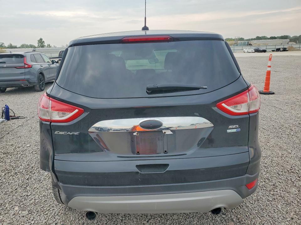 Photo 6 from auction – 2013 FORD ESCAPE with VIN 1FMCU9HX0DUC10406