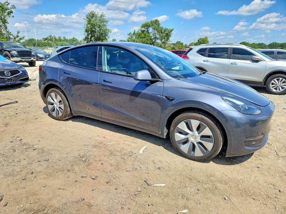 Снимка 4 от търг – 2023 TESLA MODEL Y с VIN 7SAYGDEE1PF891148