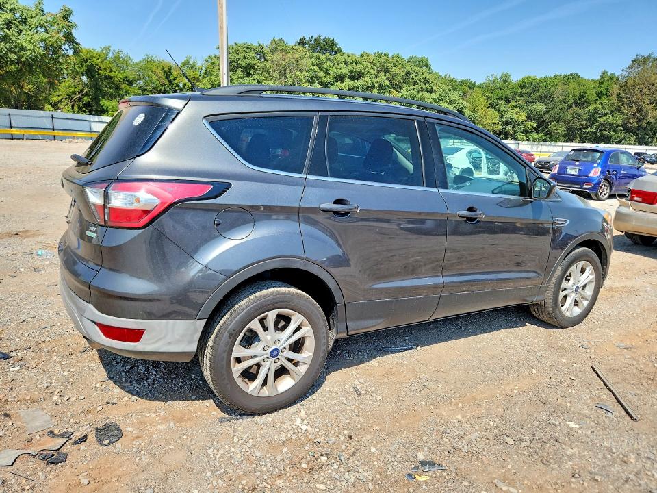 Photo 3 from auction – 2018 FORD ESCAPE with VIN 1FMCU9GD6JUB75468