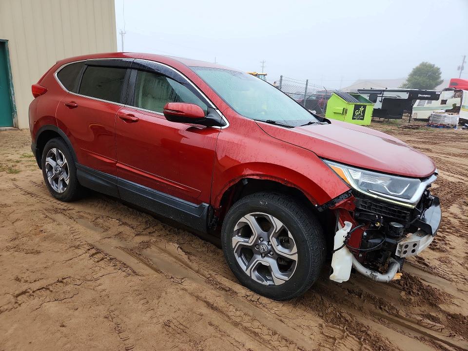 Photo 4 from auction – 2017 HONDA CR-V with VIN 2HKRW2H86HH658965