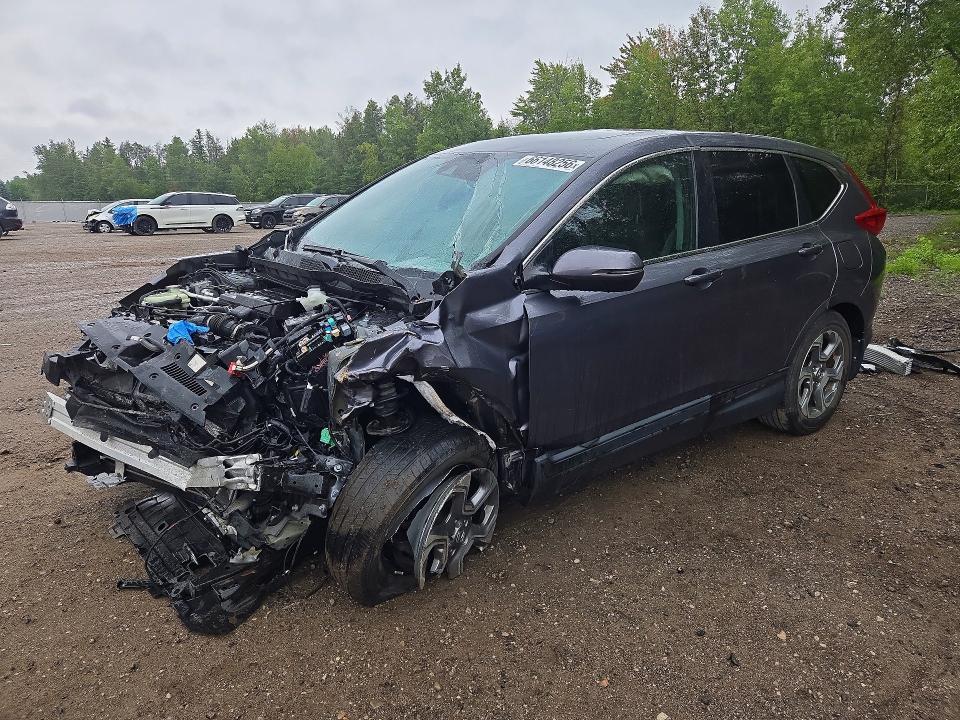 Photo 1 from auction – 2018 HONDA CR-V with VIN 2HKRW2H53JH146916