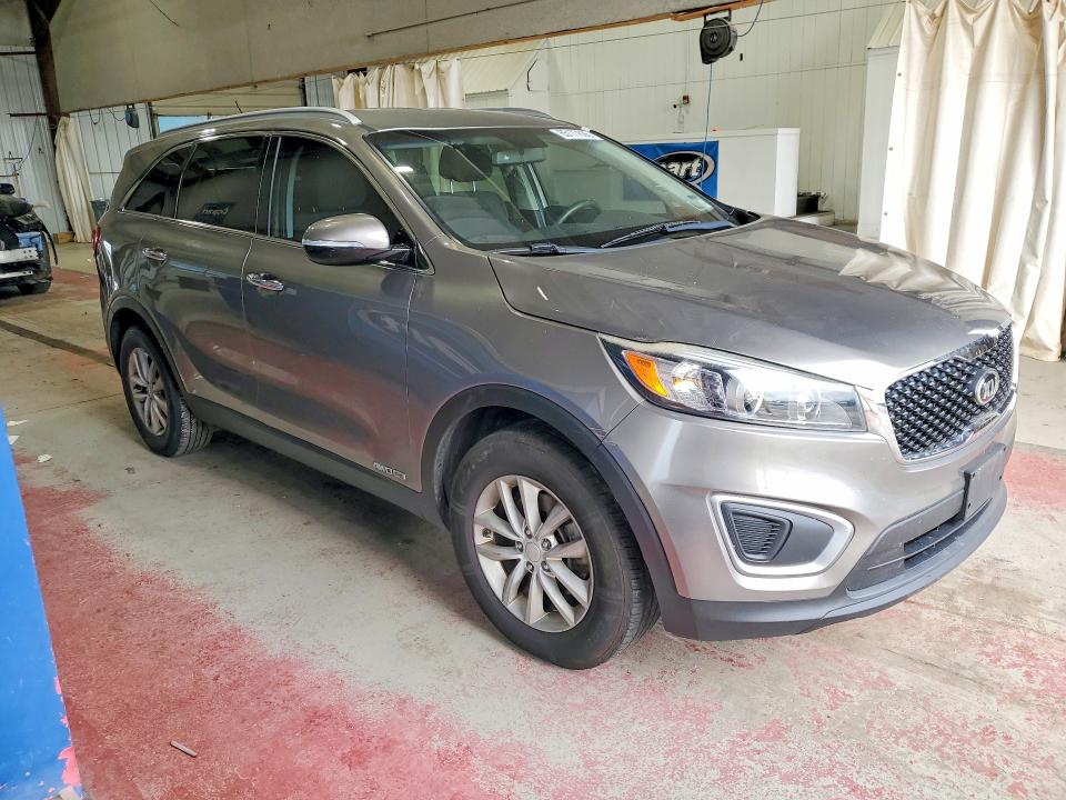 Photo 4 from auction – 2016 KIA SORENTO with VIN 5XYPGDA58GG150924