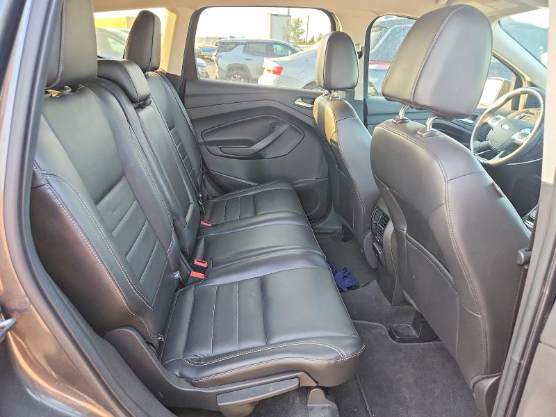 Photo 11 from auction – 2016 FORD ESCAPE with VIN 1FMCU0JX2GUC24432