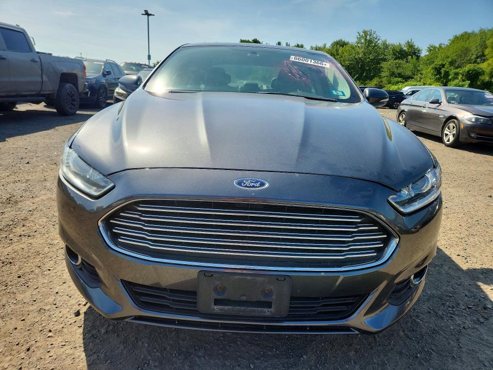Photo 5 from auction – 2016 FORD FUSION with VIN 3FA6P0T95GR294303