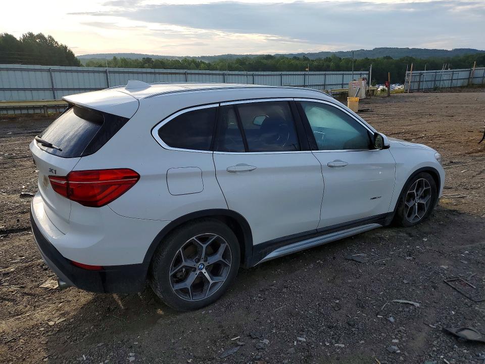Photo 3 from auction – 2018 BMW X1 with VIN WBXHT3C34J5F90974