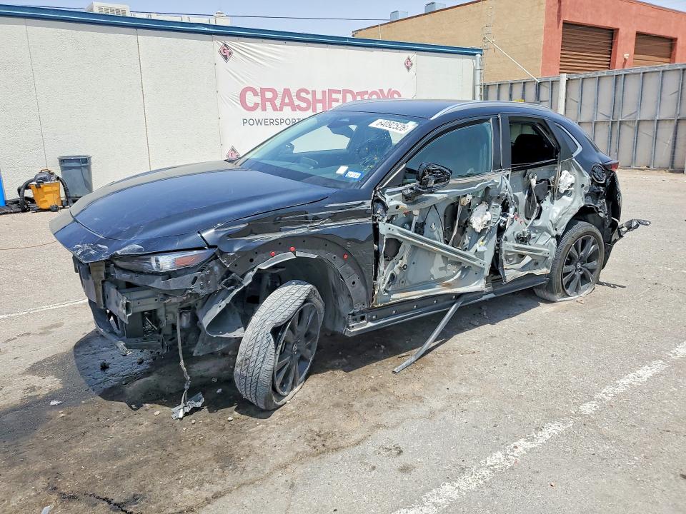 MAZDA CX-30 2024 with VIN 3MVDMBBM0RM611690 - Photo from auction