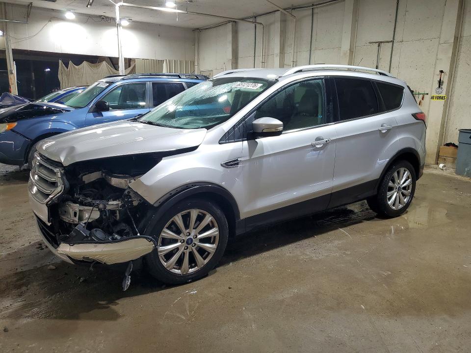 FORD ESCAPE 2017 with VIN 1FMCU0J95HUA64680 - Photo from auction