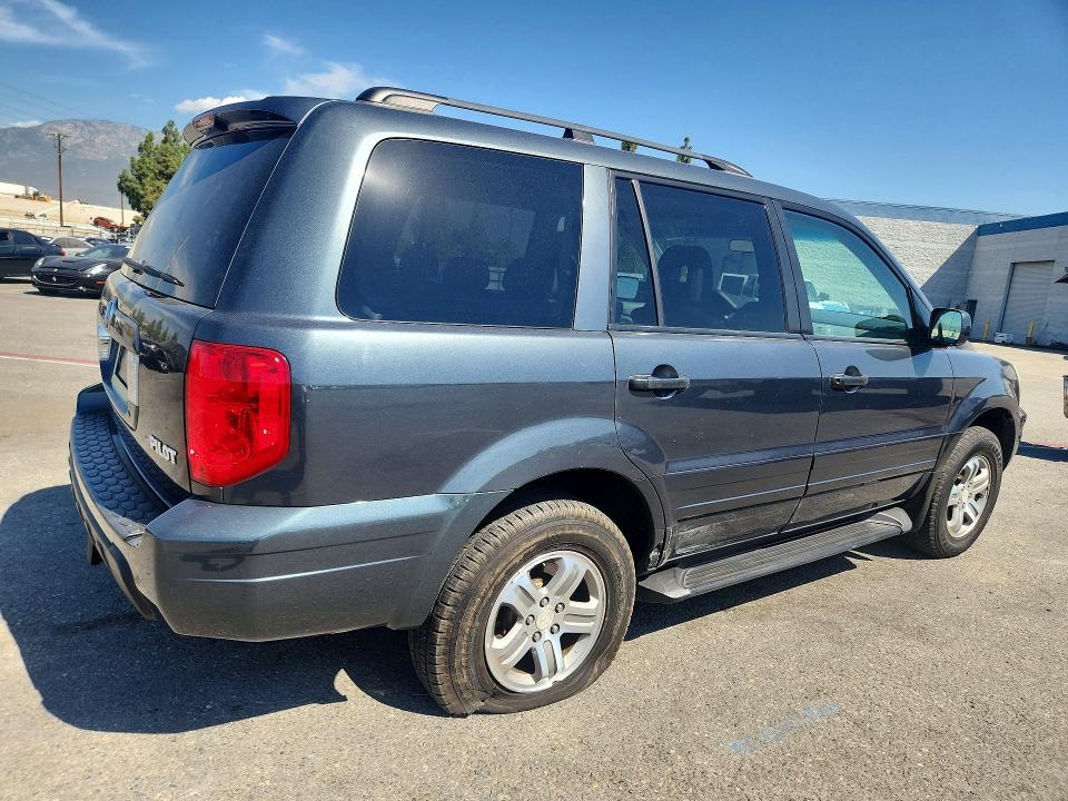 Photo 3 from auction – 2003 HONDA PILOT with VIN 2HKYF18573H550665