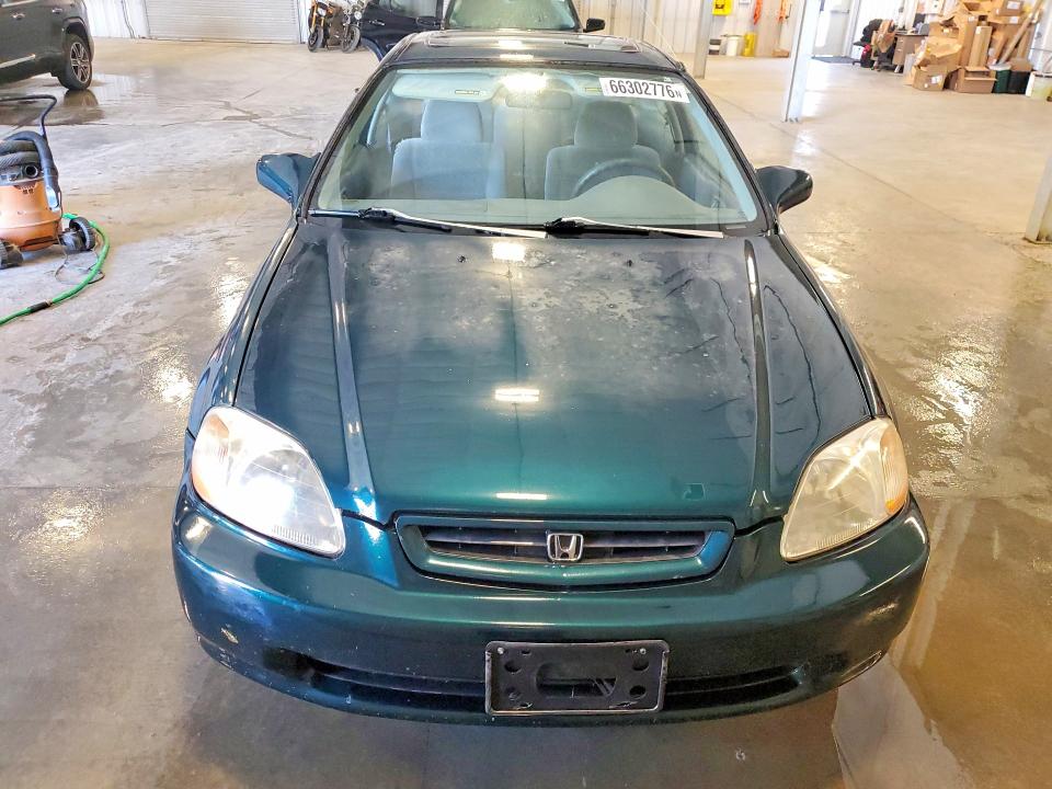 Photo 5 from auction – 1997 HONDA CIVIC with VIN 1HGEJ8250VL115344