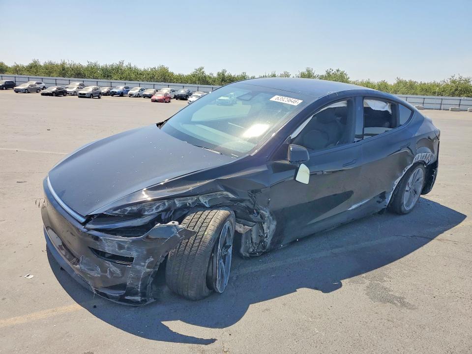 TESLA MODEL Y 2026 with VIN 7SAYGAEE9TF600940 - Photo from auction